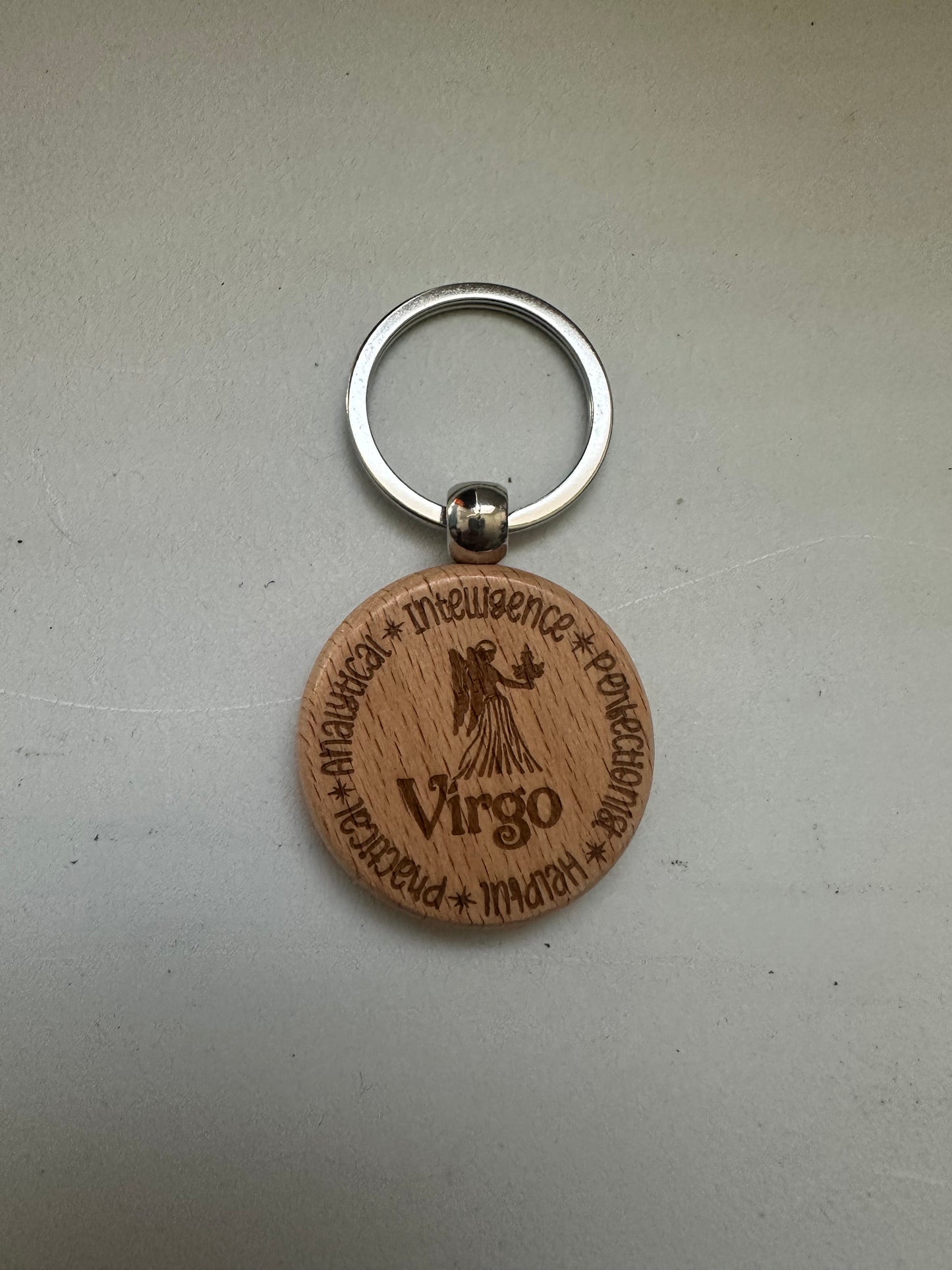 Wooden keychain engraved with Zodiac signs