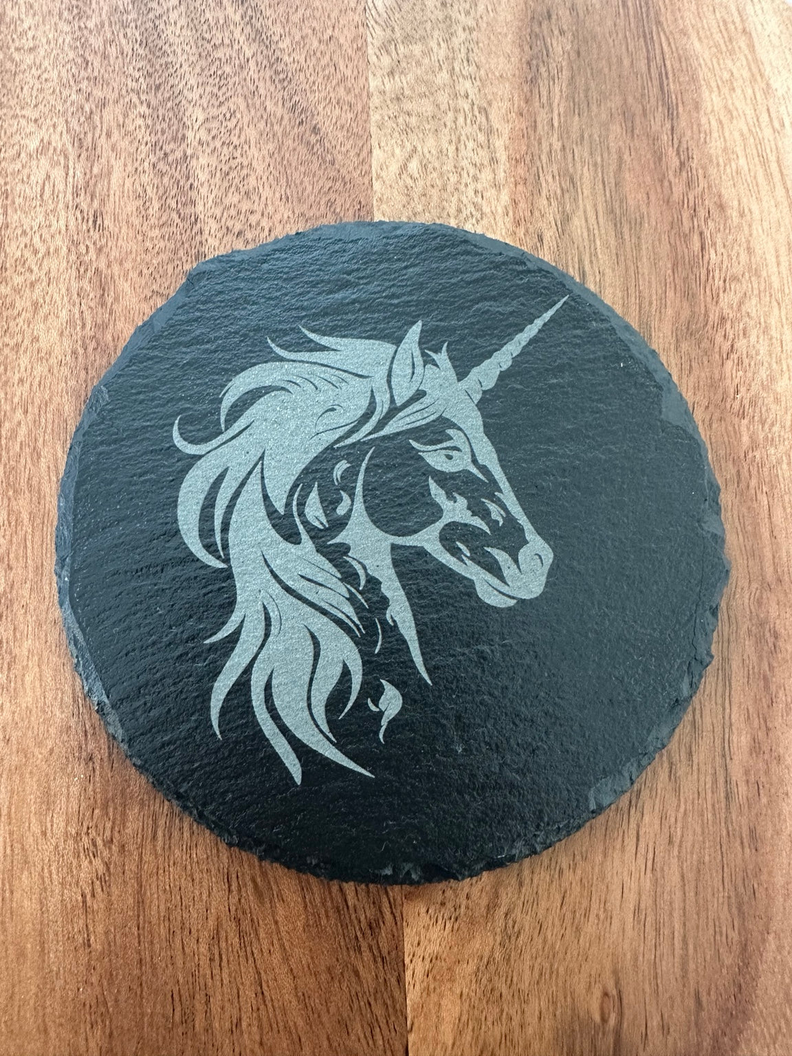 Laser engraved slate coaster with unicorn design