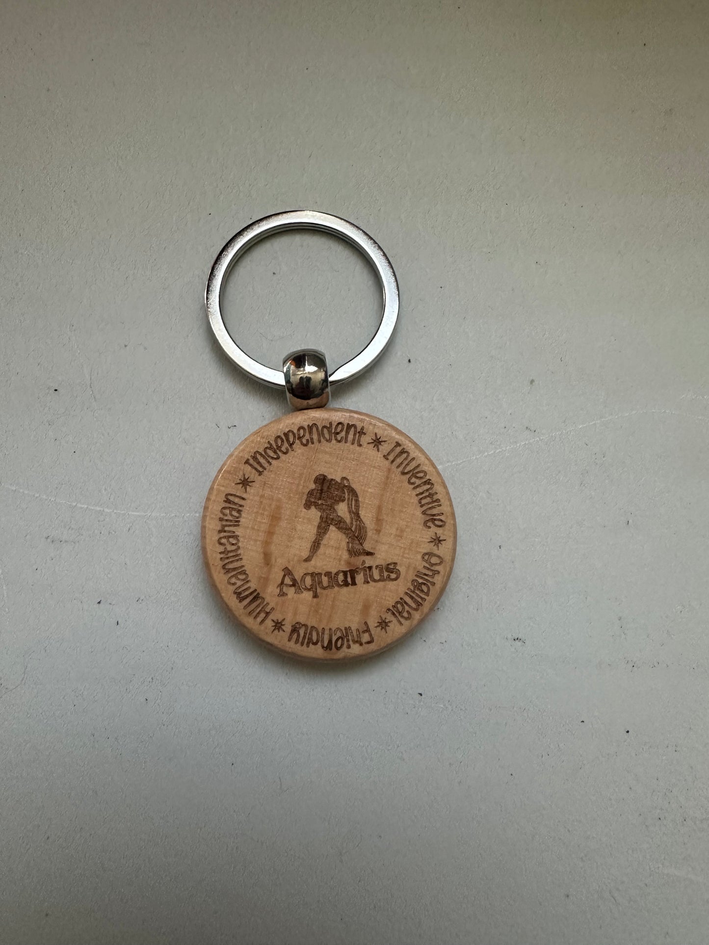 Wooden keychain engraved with Zodiac signs
