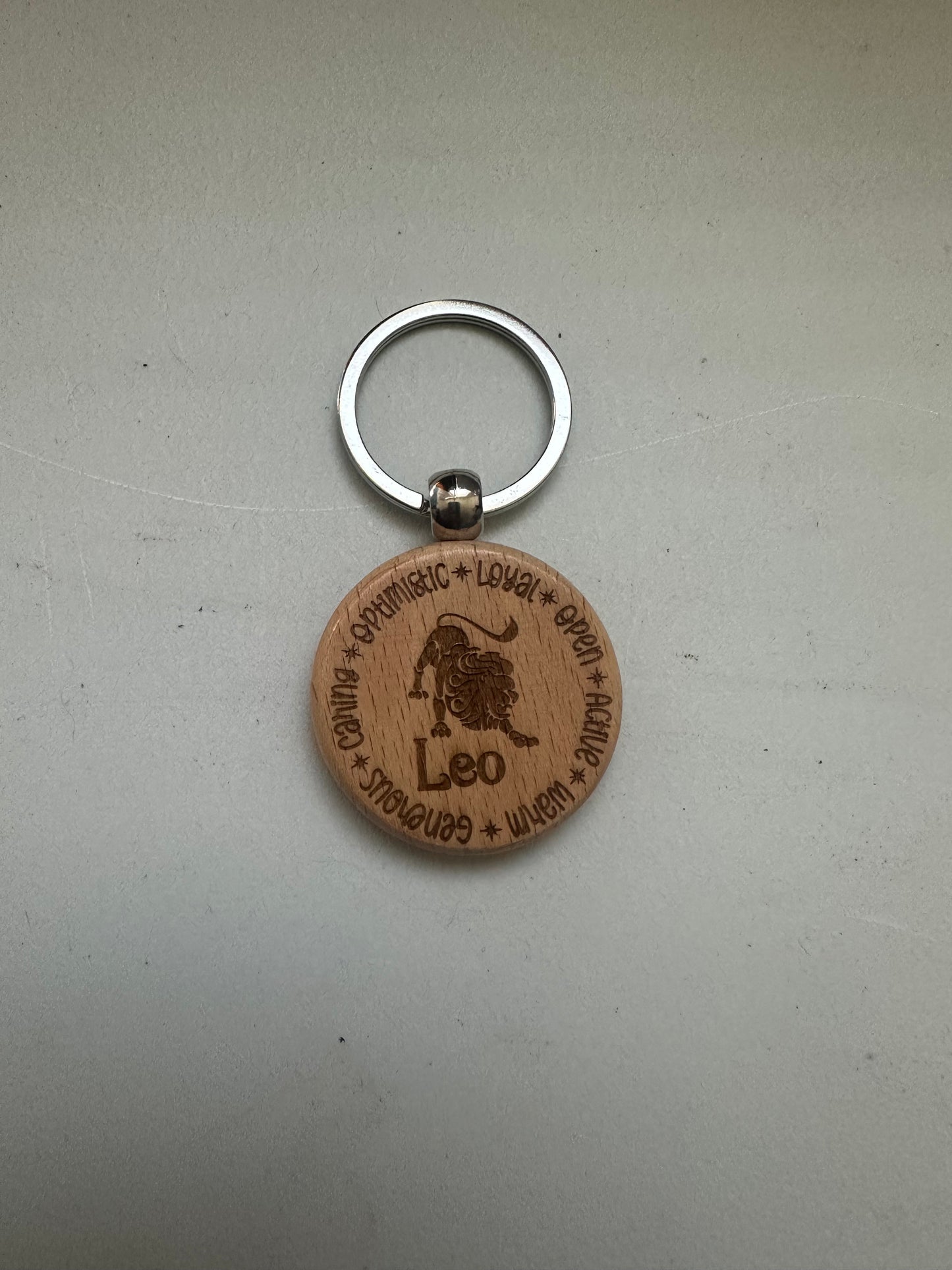 Wooden keychain engraved with Zodiac signs