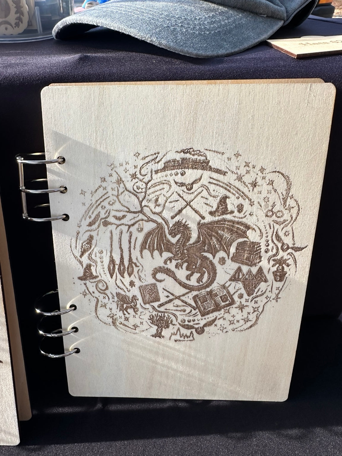 A5 basswood notebook with laser engraved dragon and magical design