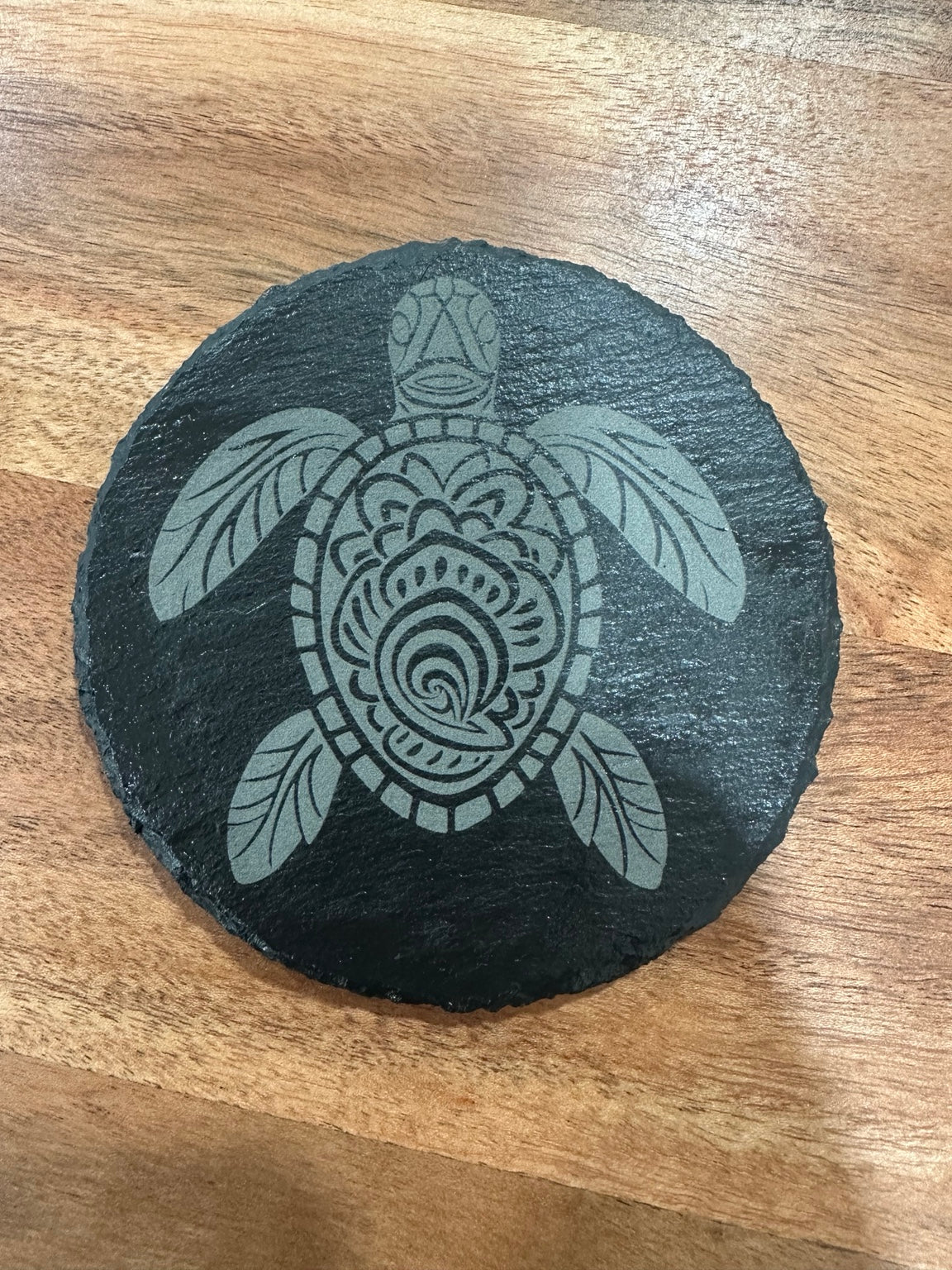 Laser engraved slate coaster with decorative sea turtle design